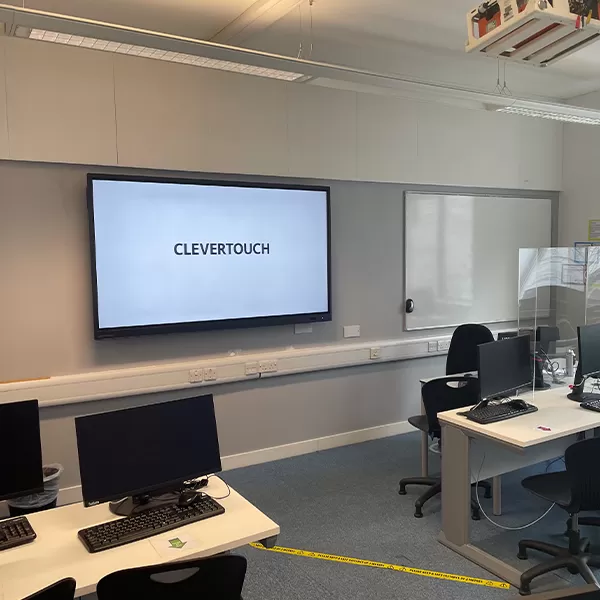 Clevertouch IMPACT Plus on the wall in an IT classroom