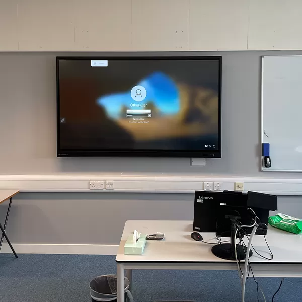 Clevertouch IMPACT Plus on the wall in a classroom