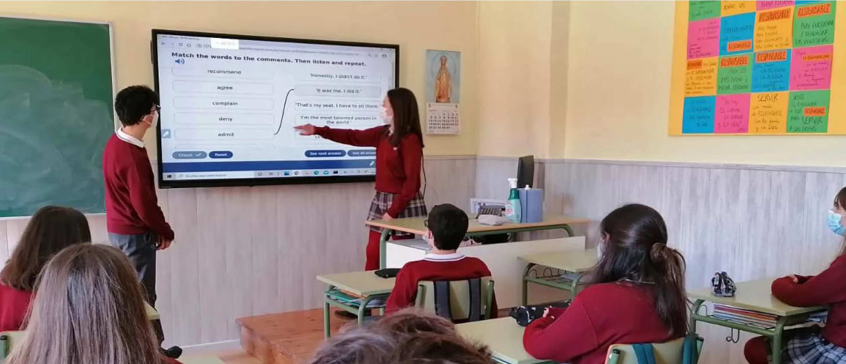 students using a Clevertouch IMPACT interactive display
