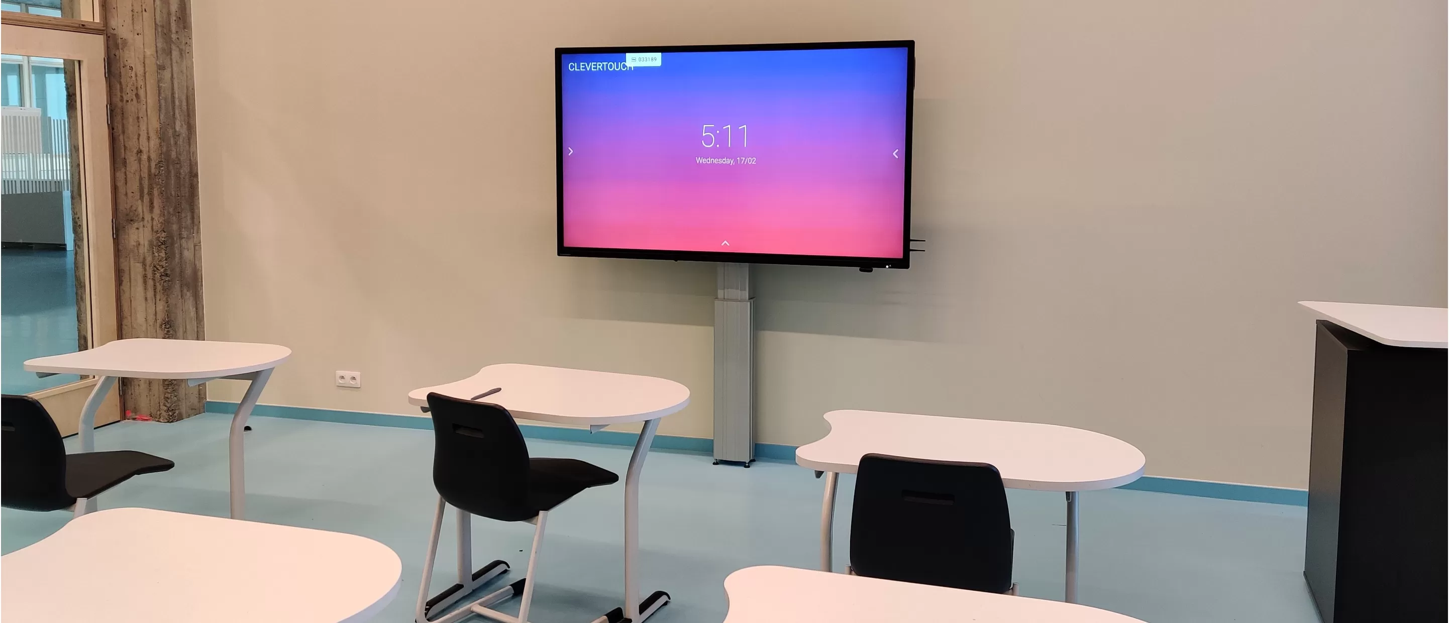 Clevertouch IMPACT on a standing in a classroom