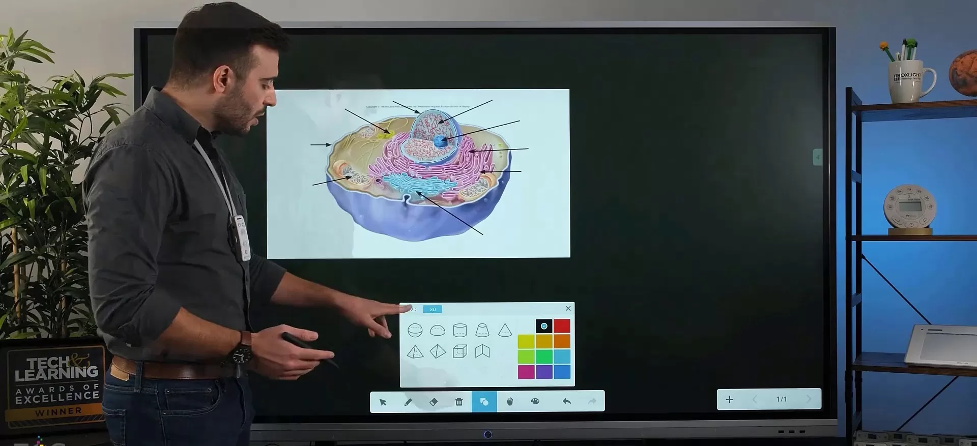 teacher pointing at a ProColor display while wearing a microphone