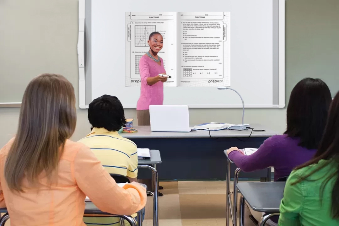 MimioView 350U Document Camera being used to film a textbook and project onto a whiteboard