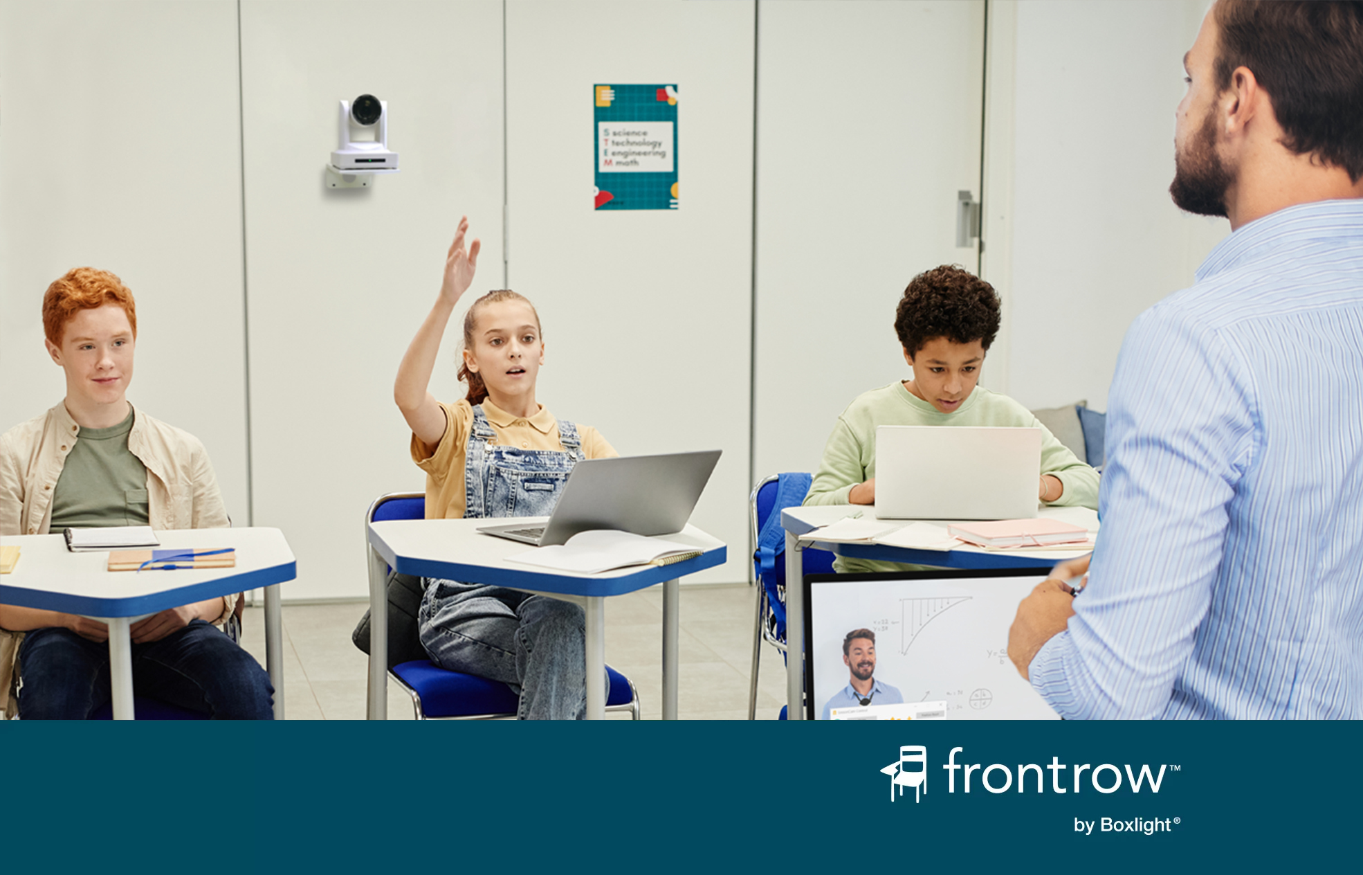 attention! used in a classroom to share a message from the principal with a blue banner saying 'FrontRow by Boxlight' across the bottom