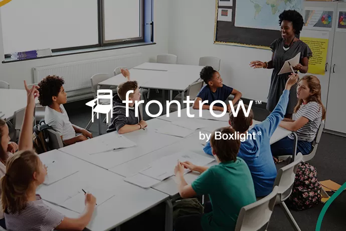 teacher using FrontRow in a classroom with the Frontrow logo over the top