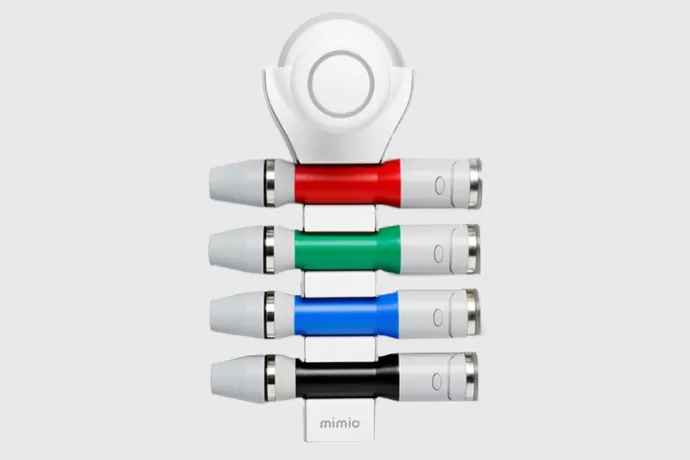 Mimio capture pens in blue, red, green and black on the tabletop recharging tray