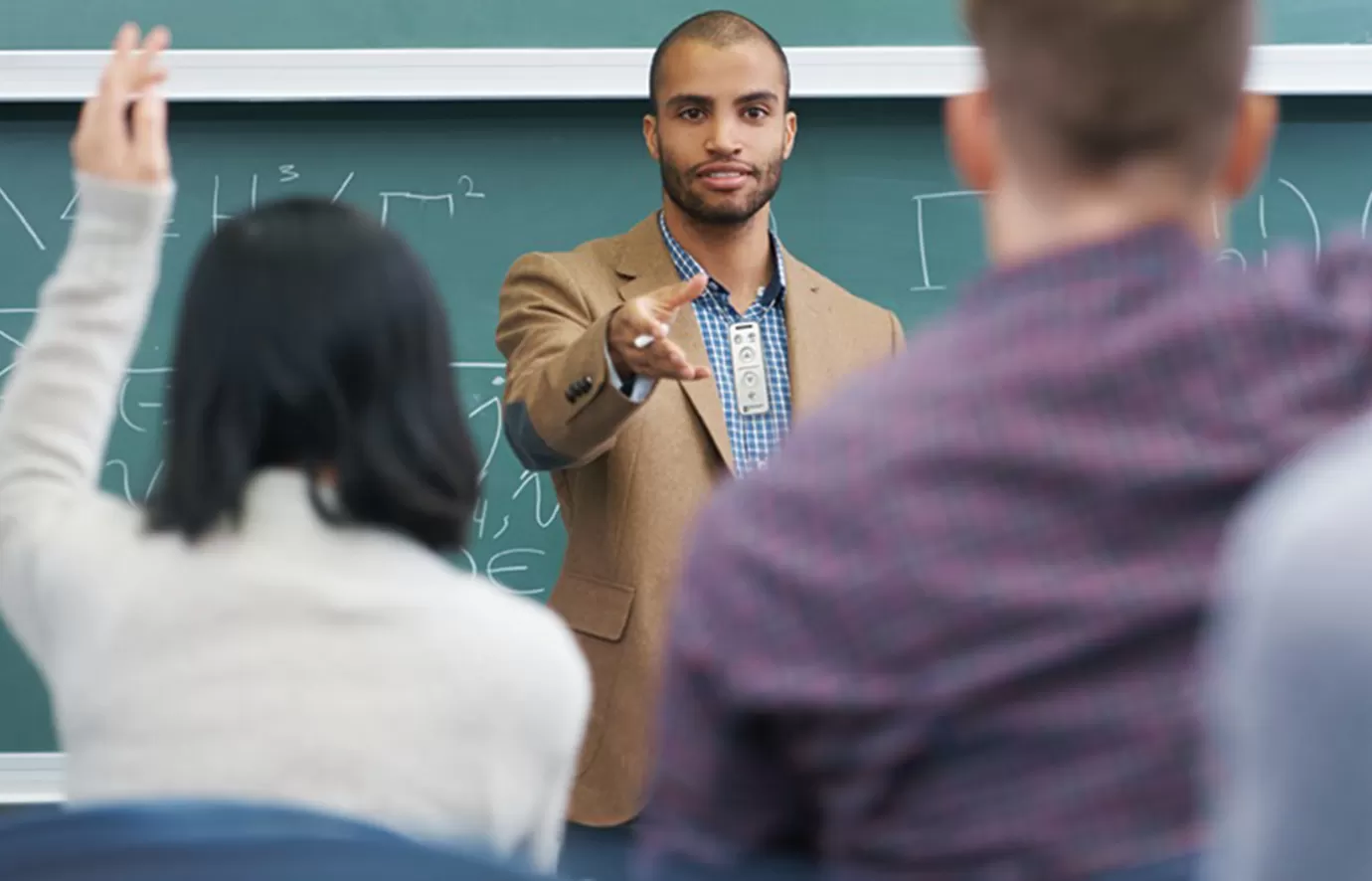 teacher using a MimioClarity microphone