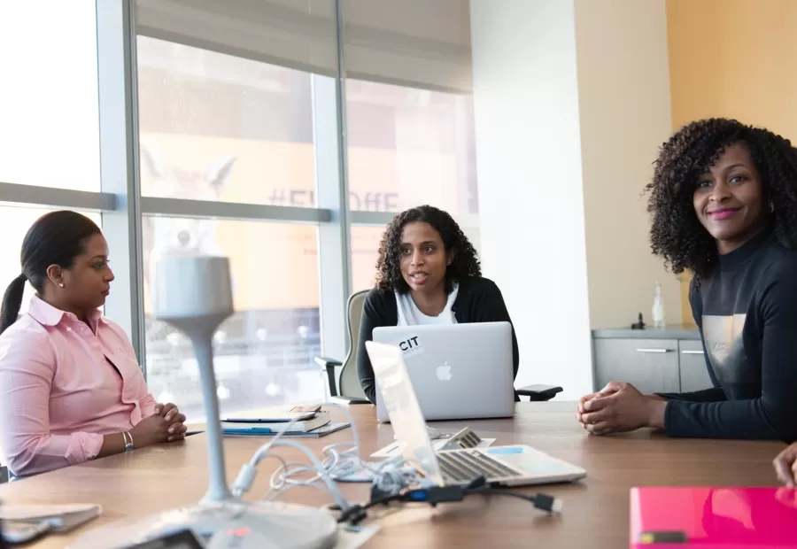 three people in a meeting