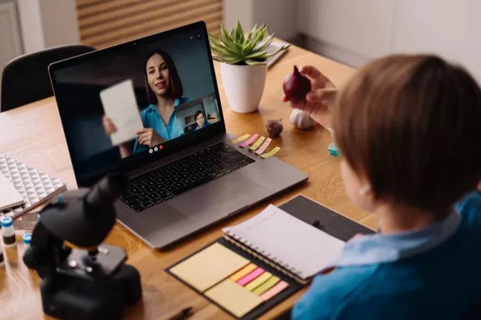 preteen-boy-uses-laptop-make-video-call