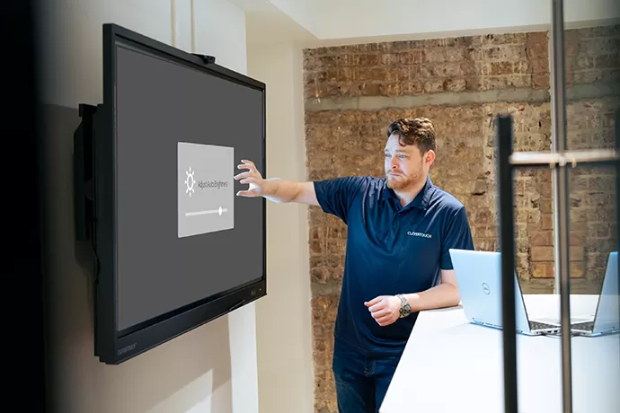 technician using a clevertouch screen
