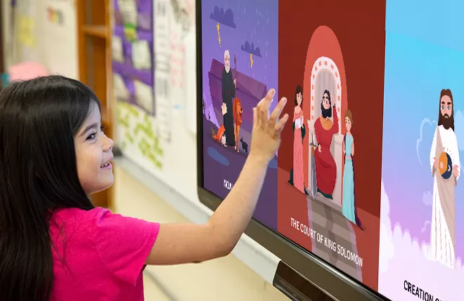child using an interactive screen