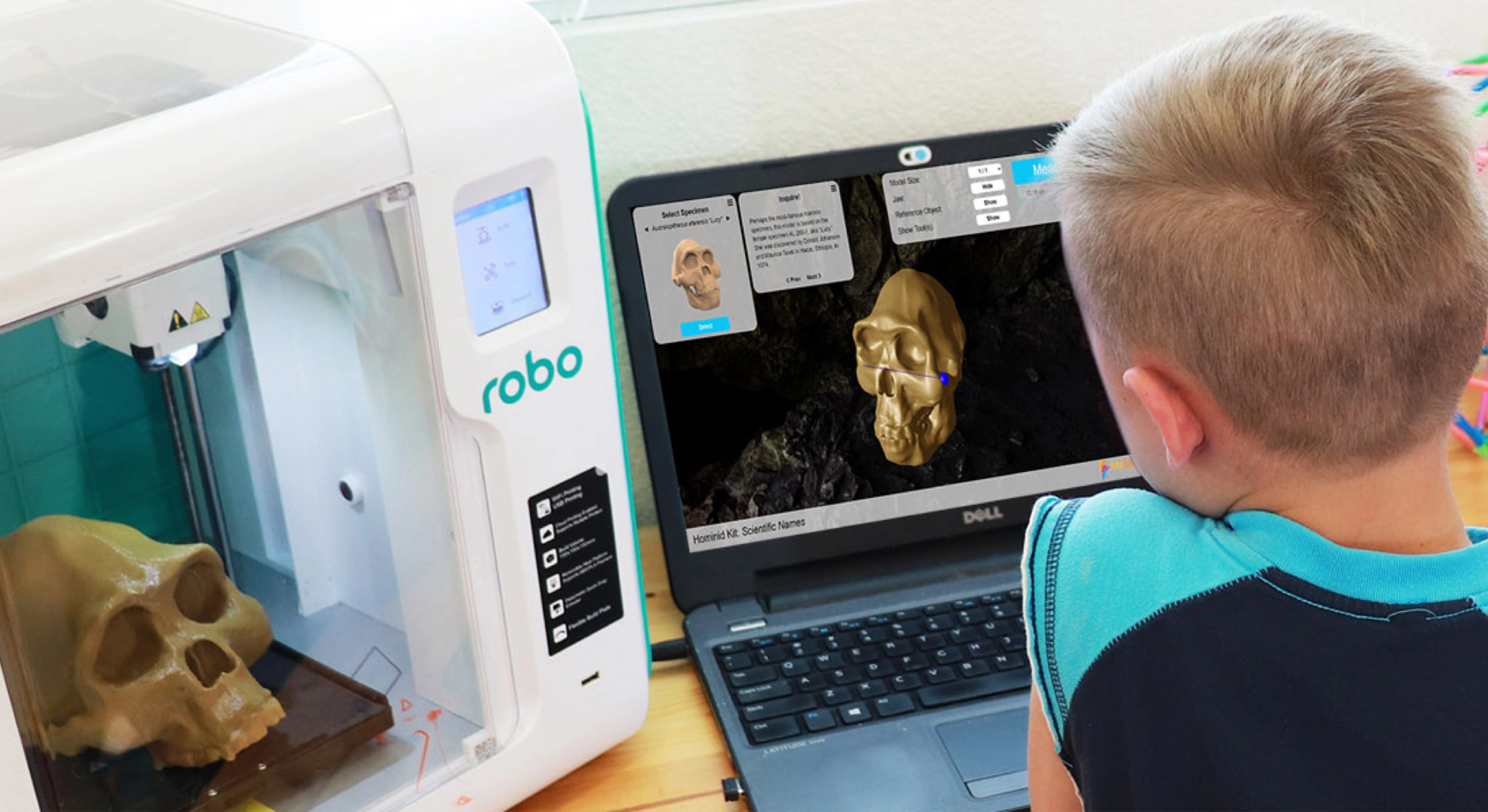 Student using robo to analyis a hominid scull