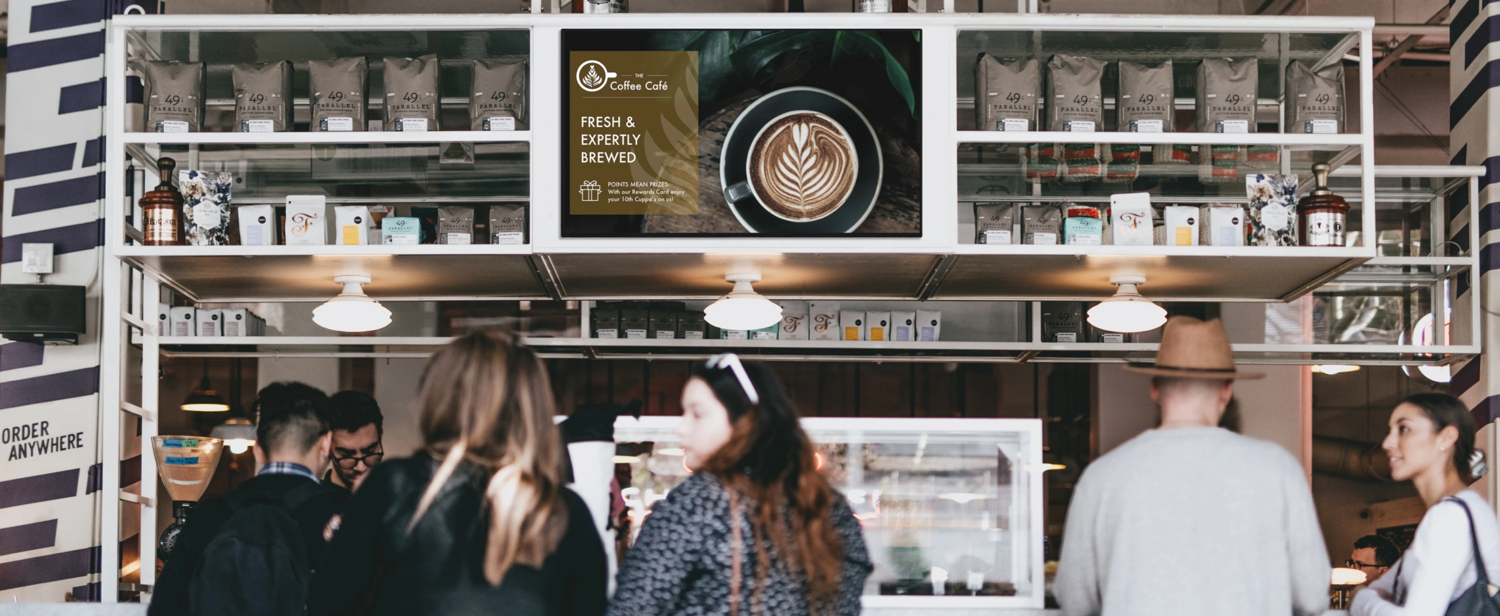 CM Series display screen showing rewards card information in a coffee shop